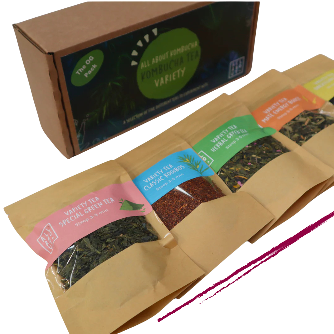 All About Kombucha OG tea variety pack with five kraft pouches of loose leaf tea, including green tea, rooibos, herbal green, and berry blends, displayed beside branded packaging box.